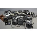 A quantity of vintage cameras to include Minolta , Kodak , Agfa and others