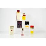 A group of part used perfumes, including Dolce & Gabbana, Arden Beauty, Moschino with box, and