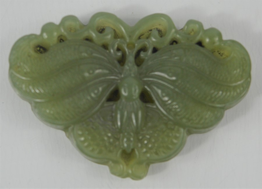 A Chinese natural Heitian green jade handcarved butterfly pendant