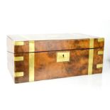 A 19th century campaign style burr walnut writing box with leather clad slope, with key and secret