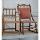An Edwardian upholstered rocking chair together with an oak kitchen chair