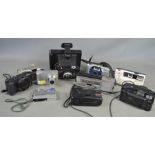 A quantity of vintage film cameras and some digital cameras to include Sony , Polaroid , Canon and
