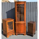 A reproduction mahogany glazed cabinet , side cupboard and corner cupboard