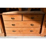 An antique pine chest of two over two long drawers. 74cm high x 112cm wide x 45cm depth