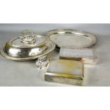 A group of silver plateware to include tureen & cover, trays, and two cigar boxes.