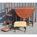 An Edwardian mahogany cake stand together with a Victorian brass warming pan and a drop leaf table