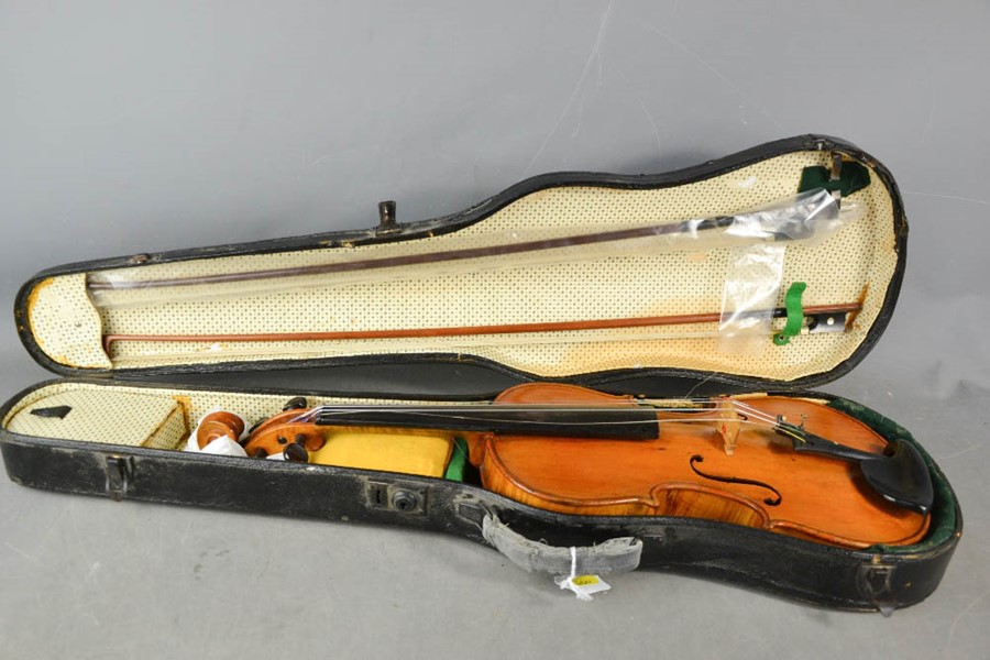 A Brightwood & Darcy violin, together with two bows, and hard case.