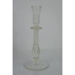 A Georgian glass candlestick with a double series air twist stem and teardrop. 21cm