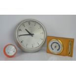 A vintage Synchronome electric clock together with a dinlex thermometer and a Short and Mason
