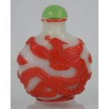 A Vintage Chinese Peking overlaid glass snuff bottle, jade stopper with spoon