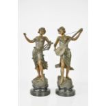 A pair of 19th century spelter figures playing musical instruments, stamped T R Richard.