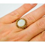 A 18ct gold and opal ring, 3.7g.