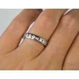 18ct white gold diamond set band with seven brilliant cut diamonds total weight approx 0.35cts -