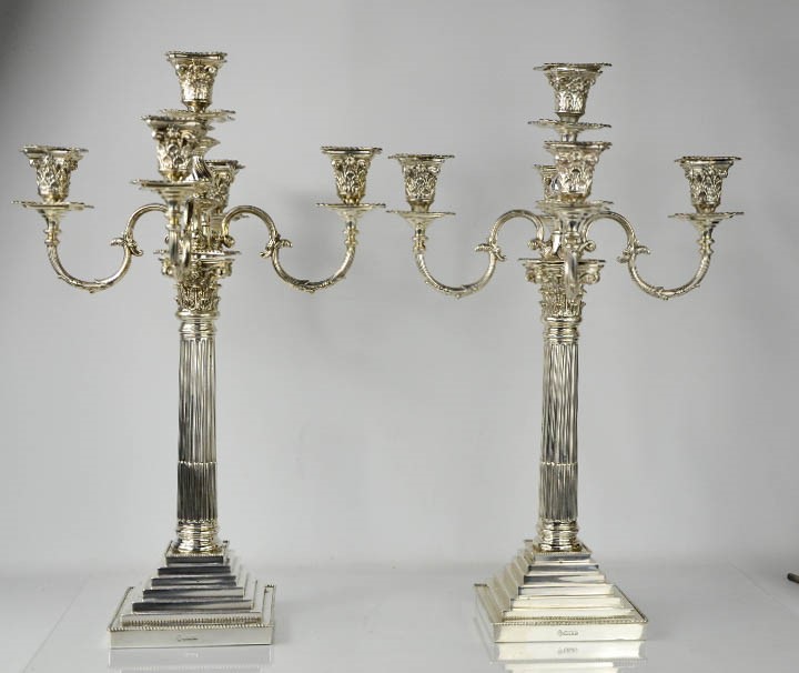 An impressive and fine pair of silver candelabras, by Richard Martin and Ebernezer Hall, the eight