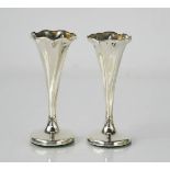 A pair of Victorian silver trumpet vases, with scallop form top, Birmingham 1899, weighted bases