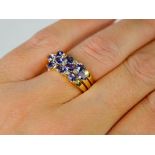 A 14ct yellow gold Tanzanite and diamond contemporary ring - Size L - 3.5g