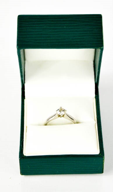 A platinum and diamond solitaire ring, the brilliant cut diamond approximately 0.41ct, assessed as H