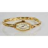 An Art Deco ladies 9ct gold watch
