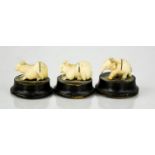 Three 19th century ivory place card holders in the form of animals.