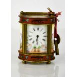 A French miniature 19th century mantle clock, with porcelain dial and side panels painted with