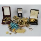 A quantity of costume jewellery to include some silver and gold plated items.