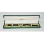 A Gucci 3000M gold plated wristwatch with black dial in original box
