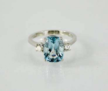 A platinum, aquamarine and diamond ring, the rectangular cushion cut aquamarine approximately 3. - Image 5 of 5
