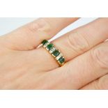 A 18ct gold, diamond and emerald ring. size Q 3.7g