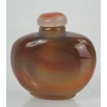 A Chinese handcarved agate snuff bottle