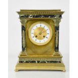 A 19th century enamelled mantle clock enclosed by bevelled glass panel, 32cm high.