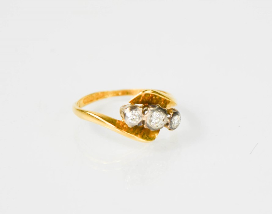 An 18ct gold and three stone diamond ring, size K. - Image 3 of 4