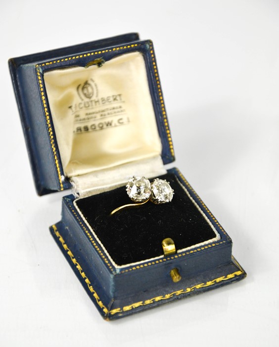 An 18ct gold 'Toi et Moi' diamond crossover ring, set with two large diamonds, each approximately - Image 7 of 8