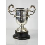 A silver trophy bearing presentation inscription, Sheffield 1929, James Dixon & Sons, raised on a
