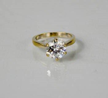 A solitaire ring stamped 750 and maker JN to the shank, Paste stone / crystal, size O/P, - Image 4 of 4