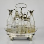 A George III silver and glass condiment set, by Robert Hemmel, with a boat shaped stand, standing on