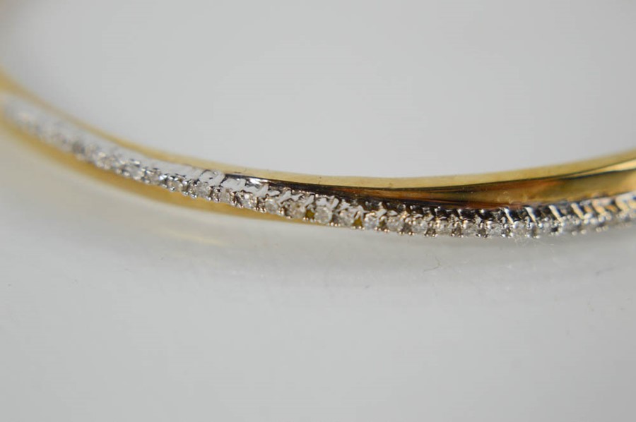 A 9ct yellow gold diamond set bangle - 7.6g - Image 2 of 2