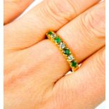 A 9ct gold, diamond and emerald ring. size Q 2.8g