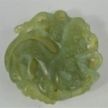 A Vintage Chinese natural Heitian green jade handcarved double sided dragon pendant