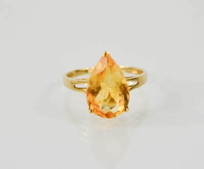 A 9ct yellow gold pear shape citrine approximately 4cts, size P, 2.3g.