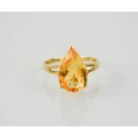 A 9ct yellow gold pear shape citrine approximately 4cts, size P, 2.3g.