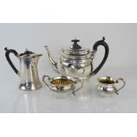 A Georgian silver teapot, together with three silver plated items, 14.22toz.