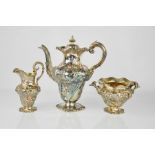 A fine William IV chased three piece bulbous shape tea service, by Charles Fox, with raised floral