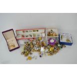 A quantity of jewellery to include a pink earring box, necklaces, earrings, trinkets and other