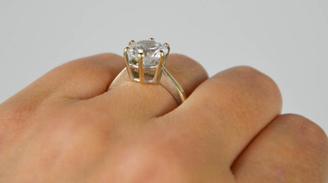 A solitaire ring stamped 750 and maker JN to the shank, Paste stone / crystal, size O/P, - Image 2 of 4
