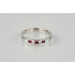 An 18ct white gold ruby and diamond ring, size L - weight 3.7g
