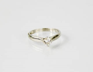 A platinum and diamond solitaire ring, the brilliant cut diamond approximately 0.41ct, assessed as H - Image 2 of 3