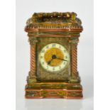 A miniature 19th century continental gilt metal carriage clock, circa 1880, with Corinthian columns,