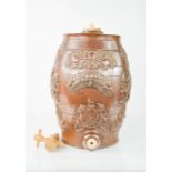 A Victorian stoneware glazed Hock barrel, modelled with raised Royal coat of arms, lions and grapes,