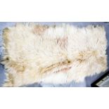 A vintage sheepskin rug.