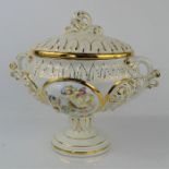 A Capo di Monte tureen and cover modeled with cherubs